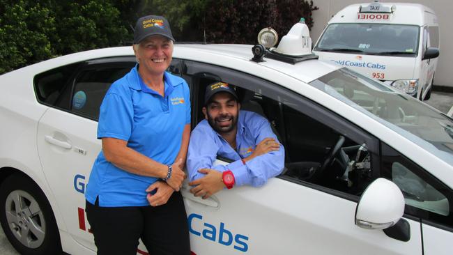 Gold Coast Cabs drivers Larriece Evans and Mandeep Arora at the company’s Helensvale depot.