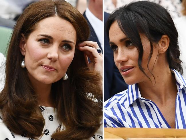 LONDON, ENGLAND - JULY 14:  Catherine, Duchess of Cambridge and Meghan, Duchess of Sussex attend day twelve of the Wimbledon Lawn Tennis Championships at All England Lawn Tennis and Croquet Club on July 14, 2018 in London, England.  (Photo by Clive Mason/Getty Images)