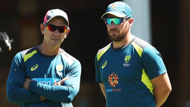 Justin Langer with Aaron Finch. Picture: Phil Hillyard