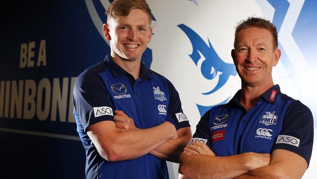 David Noble with North Melbourne skipper Jack Ziebell.