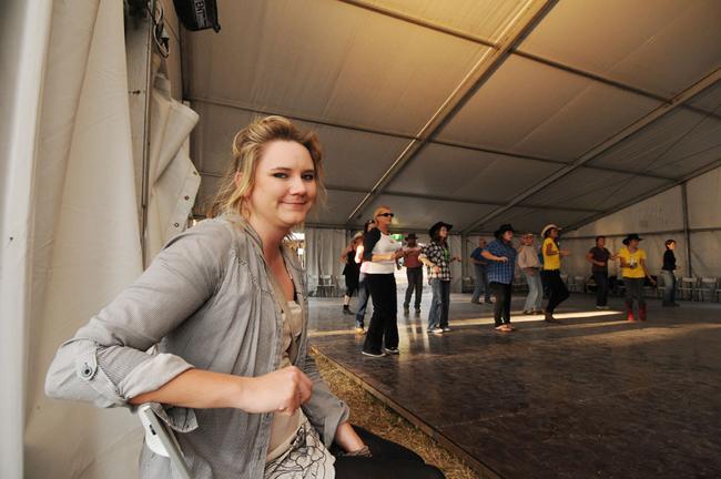 Sophie Anderson watching the dancing at the Muster. Picture: Craig Warhurst