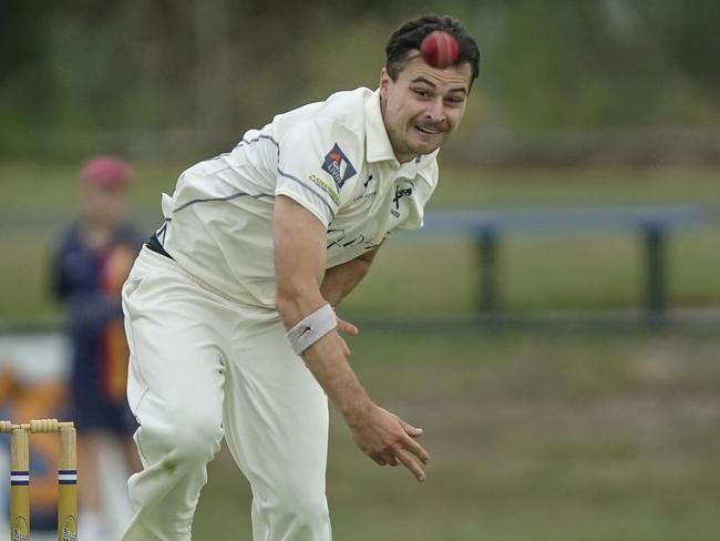 Old Peninsula bowler James Labrooy goes at Langwarrin. Picture: Valeriu Campan