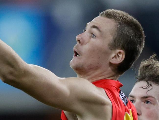 GOLD COAST, AUSTRALIA - APRIL 13: Ethan Read of the Suns in action during the 2024 AFL Round 05 match between the Gold Coast SUNS and the Hawthorn Hawks at People First Stadium on April 13, 2024 in Gold Coast, Australia. (Photo by Russell Freeman/AFL Photos via Getty Images)