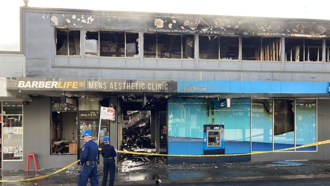 Six of the ten businesses in the arcade were destroyed, two were water damaged, and two could continue operating.