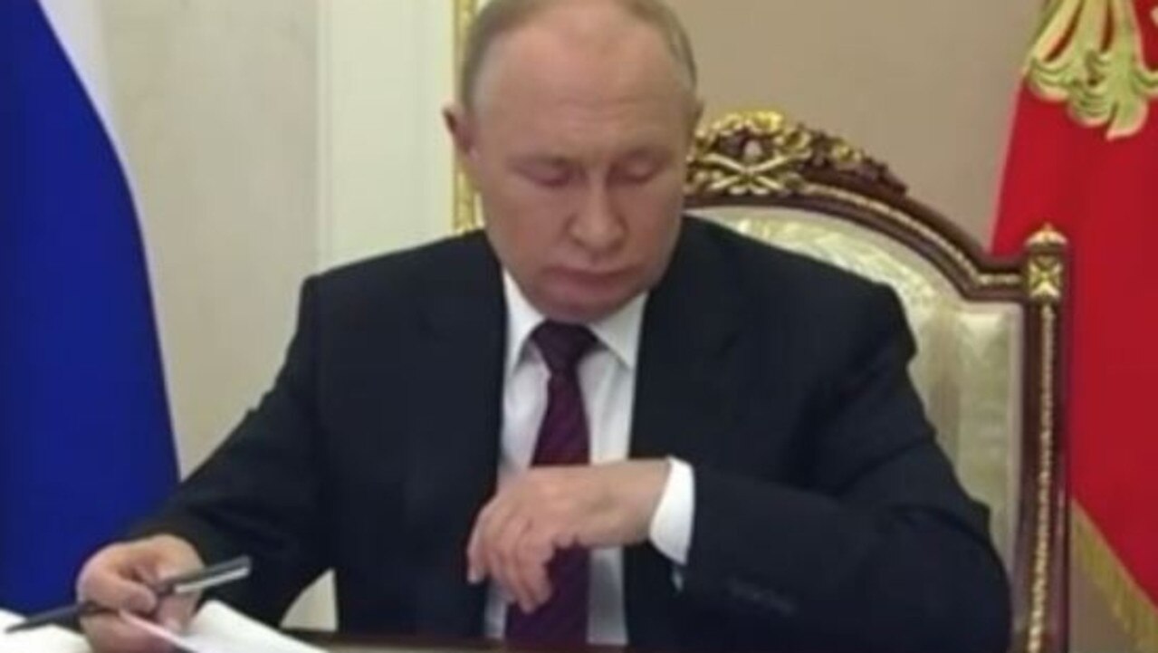 Putin was seen looking for his watch on the wrong wrist, despite always wearing it on his right hand. Picture: Supplied
