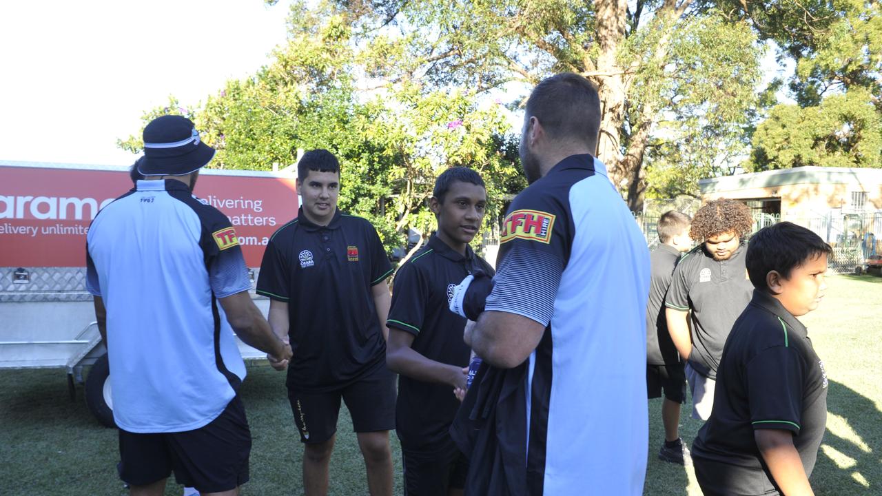 Cronulla Sharks players Shaun Johnson, Wade Graham and Will Chambers visit Orara High School. Sharks major sponsor Aramex made a $5000 donation to the Clontarf Foundation which operates at the school.