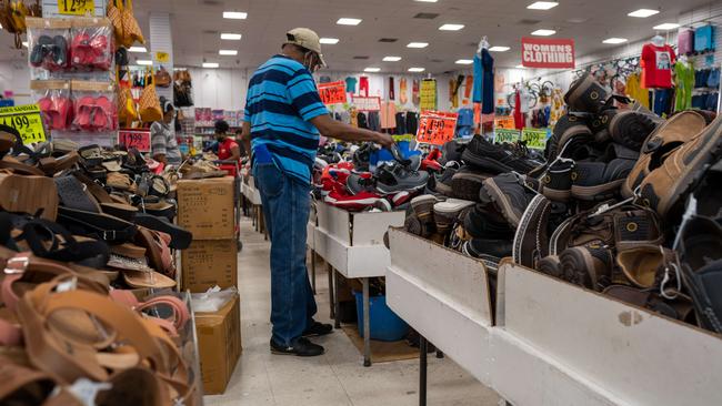 People shop at a store in the Flatbush neighbourhood of Brooklyn on June 15 in New York City.