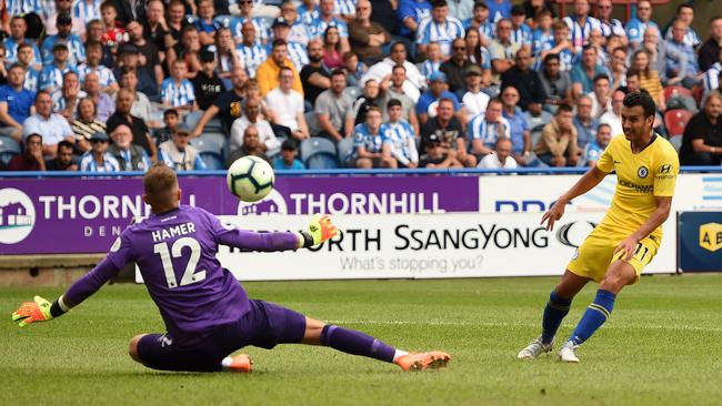 Chelsea midfielder Pedro scores the team’s third goal past Huddersfield Town goalkeeper Ben Hamer at the John Smith’s stadium in Huddersfield. Picture: AFP