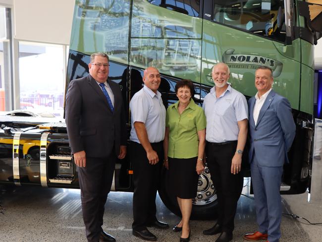 Scott Buchholz MP with members of the Nolan family as they take ownership of Volvo's 50,000th vehicle manufactured at Wacol.