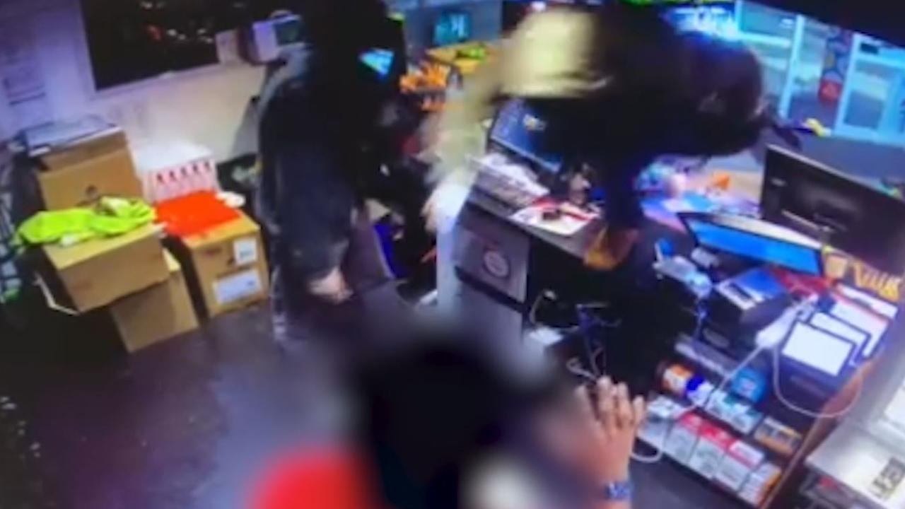 Footage showing the moment the two men jumped over the counter, where they threatened the attendant.