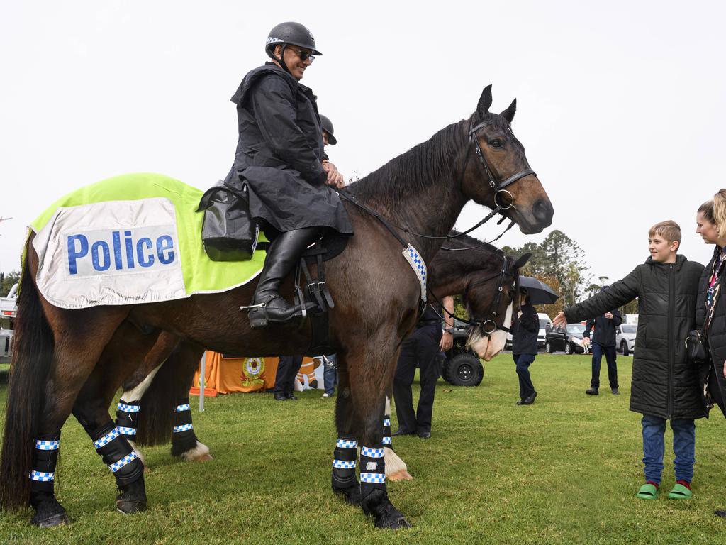 Mounted Unit officer Senior Constable Simon Shilton with Stormy and Morgan Wittmaack and son Joshua Wittmaack at the Queensland Police Community Safety and Career Expo on the TAFE oval, Saturday, May 31, 2025. Picture: Kevin Farmer