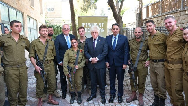 Scott Morrison and Boris Johnson meeting with Israeli troops.