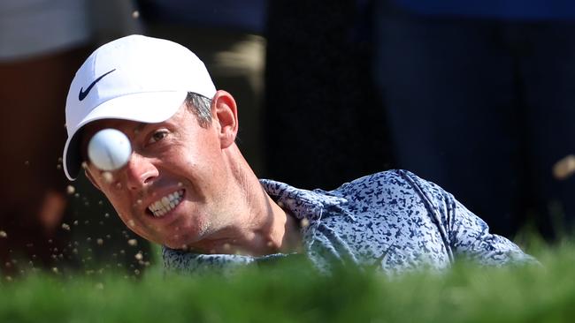 McIlroy plays a shot from a greenside bunker on the 14th hole during the Final Round on Day Five. Picture: Getty Images