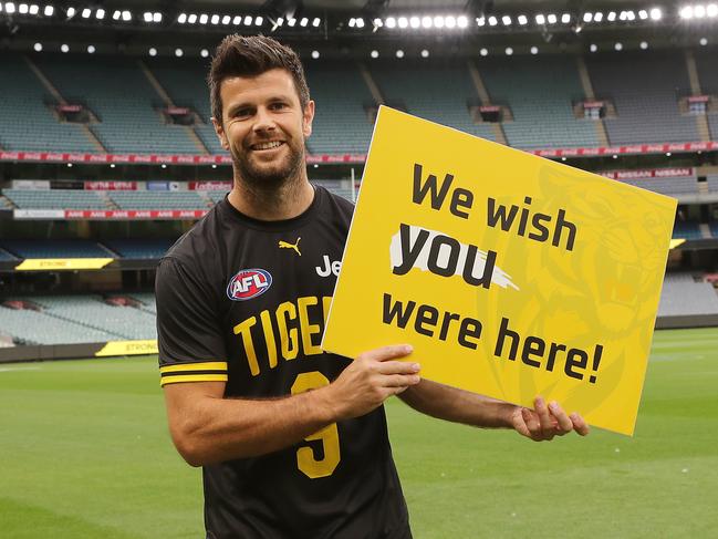 AFL Round 1. Richmond vs Carlton at the MCG..  20/03/2020.  Trent Cotchin of the Tigers holds a sign for the fans pre game   . Pic: Michael Klein