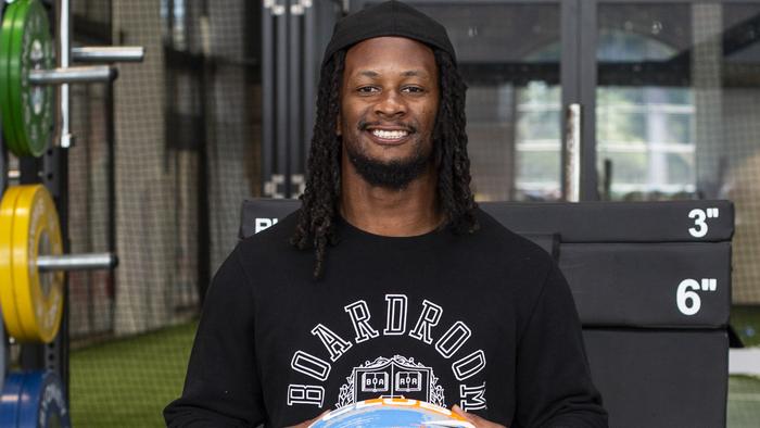 Todd Gurley poses with an NRL ball