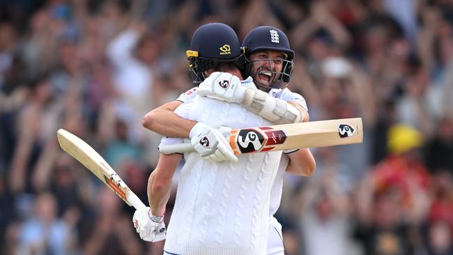 Chris Woakes of England celebrates with teammate Mark Wood after hitting the winning runs to win 3rd Test Match between England and Australia at Headingley.