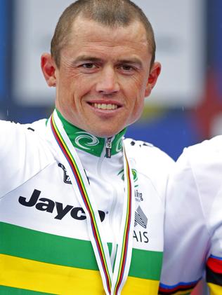 Australia's Simon Gerrans poses with his silver medal.