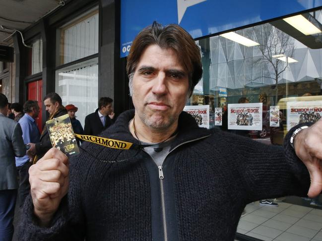 AFL footy fans queuing for tickets at Ticketek Exhibition Street after their website failed this morning. Richmond member John Karadakis can't believe all the finals went on sale at once.  Picture: David Caird