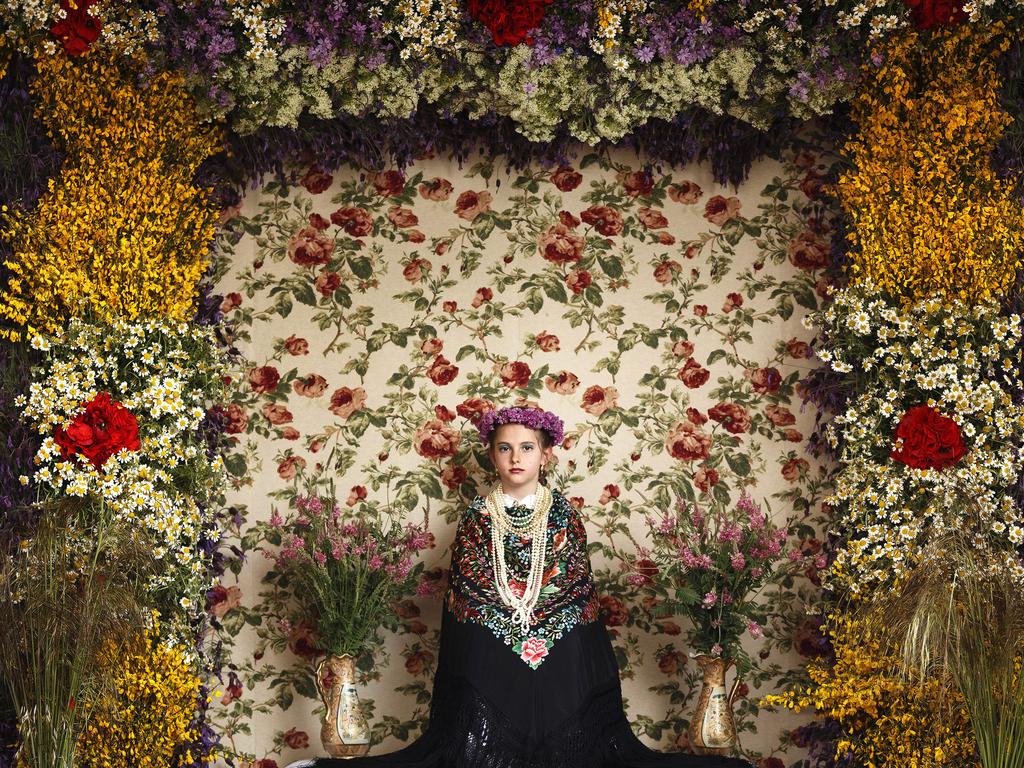 “La Maya Tradition” by Associated Press photographer Daniel Ochoa de Olza which won second prize People stories shows young girls between the age of 7 and 11 are chosen every year as ‘Maya’ for the ‘Las Mayas’, a festival derived from pagan rites celebrating the arrival of spring, in the town of Colmenar Viejo, Spain. The girls are required to sit still for a couple of hours in a decorated altar. (Daniel Ochoa de Olza/AP, World Press Photo via AP)