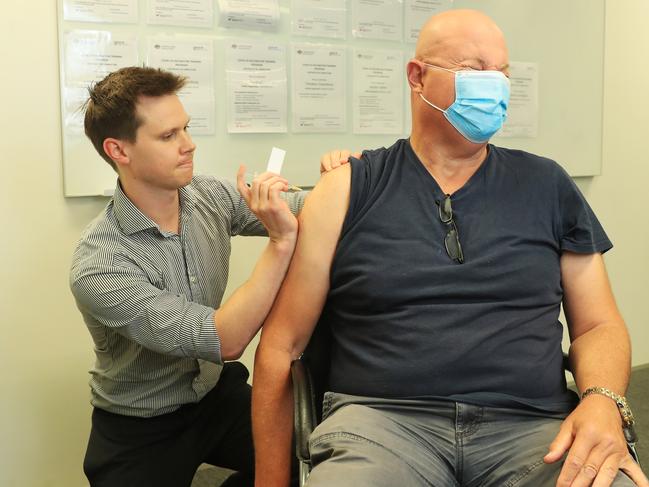 17/5/21: Dr Rob Nelson administering a COVID-19 vaccine to Viv Collard. Today is the first day that over-50's can receive their vaccination jab from their GP. John Feder/The Australian.