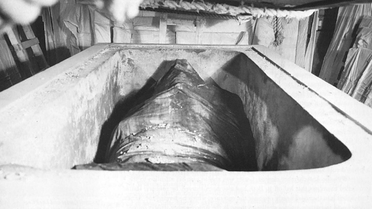 Looking inside Tutankhamen's sarcophagus in 1923. Picture: Supplied