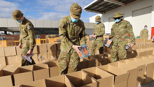 The defence force preparing generators and equipment for clean up of the storms in the Dandenongs. Picture: Alex Coppel.