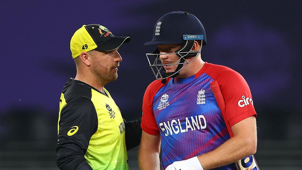 DUBAI, UNITED ARAB EMIRATES - OCTOBER 30: Aaron Finch of Australia and Jonny Bairstow of England interact following the ICC Men's T20 World Cup match between Australia and England at Dubai International Stadium on October 30, 2021 in Dubai, United Arab Emirates. (Photo by Francois Nel/Getty Images)