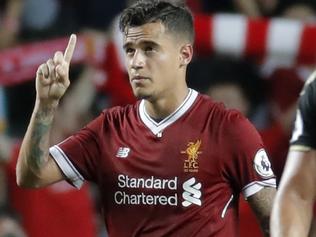 FILE - In this Saturday, July 22, 2017 file photo, Liverpool's Philippe Coutinho celebrates after scoring a goal during the final match against Leicester City FC at the Premier League Asia Trophy soccer tournament in Hong Kong. Liverpoolâ€™s American owners say Philippe Coutinho will not be sold in this transfer window, amid interest in the Brazil playmaker from Barcelona. In a short statement on Friday, Aug. 11, 2017, Fenway Sports Group say Liverpoolâ€™s â€œdefinitive stance is that no offers for Philippe will be considered.â€ (AP Photo/Kin Cheung, file)