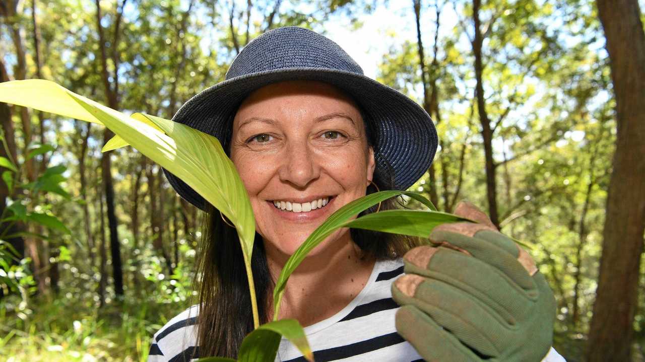 DOWN AND DIRTY: Harvest Swap founder Leonie Orton with some of the trees for planting. Picture: Warren Lynam