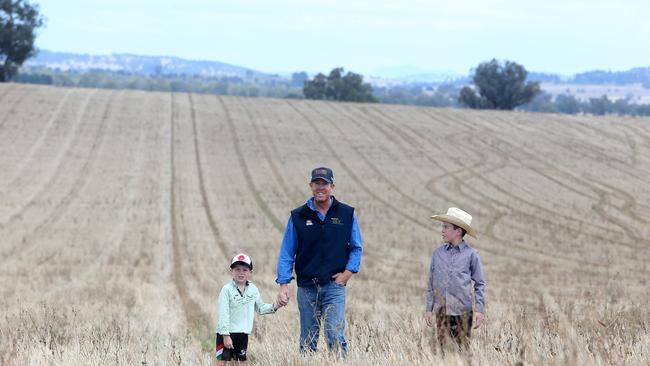 Ben Langtry, with his sons Patrick, 5, and William 10. Picture: Yuri Kouzmin