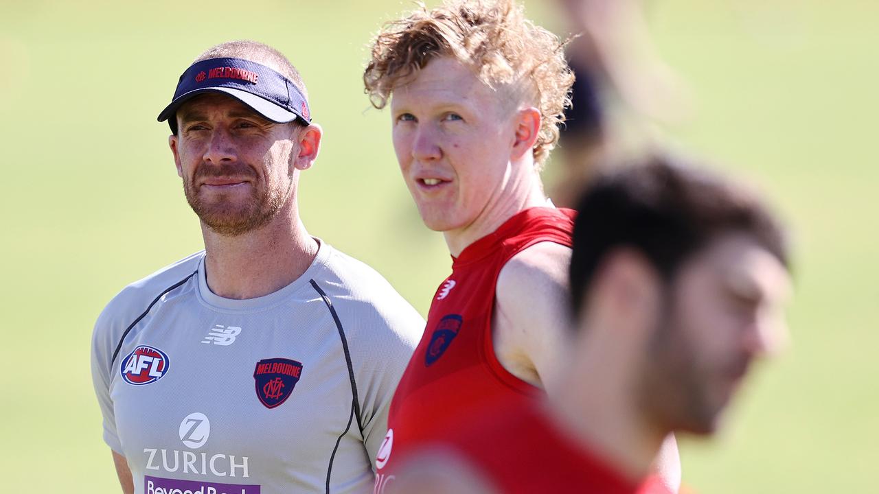 Melbourne football training at HBF Arena in Joondalup, Perth. 13/09/2021. Simon Goodwin, senior coach of the Demons with Clayton Oliver during todays light session at Joondalup . Photo by Michael Klein