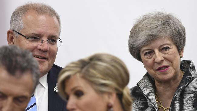 Scott Morrison speaks to British Prime Minister Theresa May during the Leader's Special event on Women's Empowerment at the G20 summit. Picture: AAP