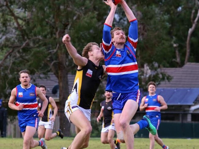 Chris Jones pulls in a mark for South Croydon. Picture: Steve Bibby