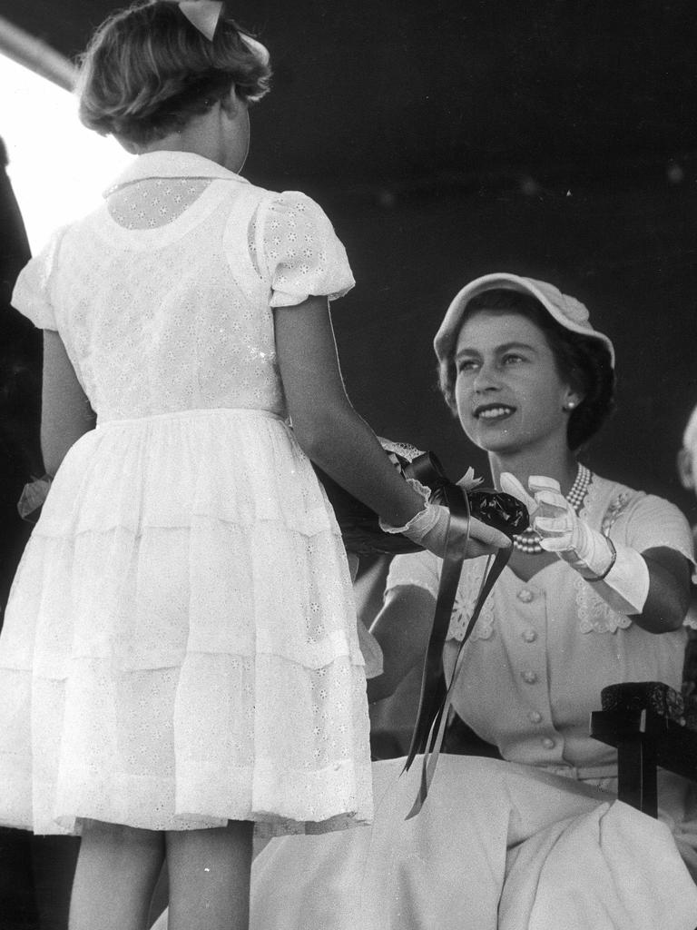 1954 Royal Tour. Queen Elizabeth receives a bouquet at Toowoomba.