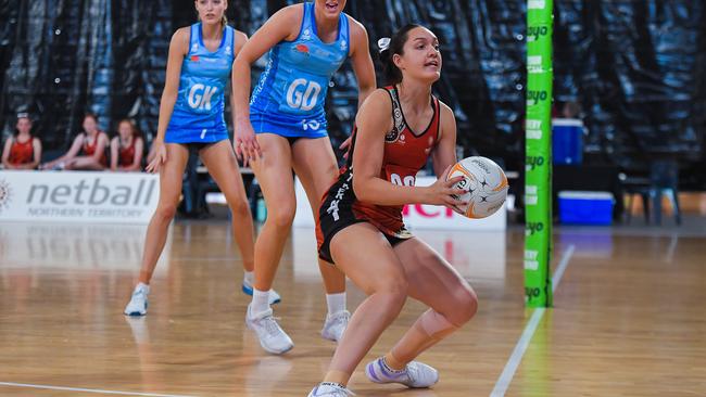 The NT’s Hinemoa Boylan with the ball in hand against NSW in the 2023 National Netball Championships. Picture: Pema Tamang Pakhrin