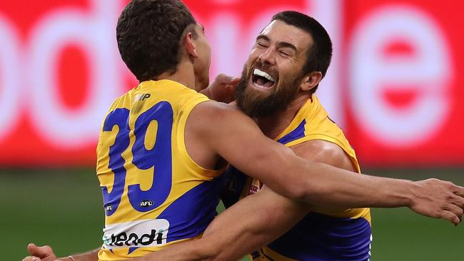 PERTH, AUSTRALIA - JULY 19: Jarrod Cameron and Josh J. Kennedy of the Eagles celebrate a goal during the round 7 AFL match between the Fremantle Dockers and the West Coast Eagles at Optus Stadium on July 19, 2020 in Perth, Australia. (Photo by Paul Kane/Getty Images)