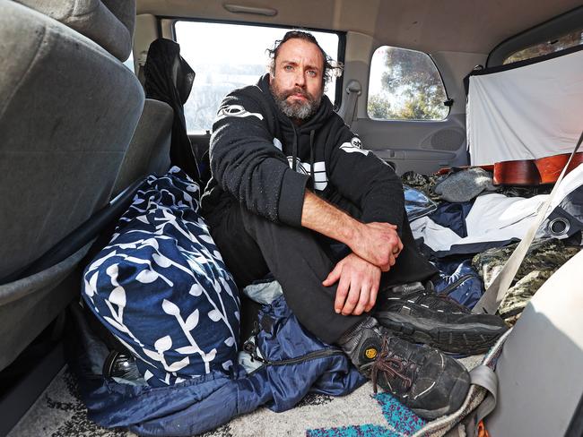 Matthew Rooke has been sleeping in his car as the unit he is living in South Hobart has been overtaken with mould. Picture: ZAK SIMMONDS