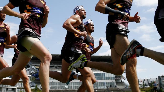 Luke Hodge and Cyril Rioli won four flags together. Picture: Colleen Petch