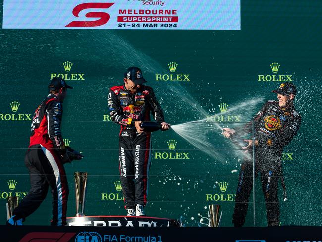 Broc Feeney (centre), Will Brown (left) and Matthew Payne (right) on the podium after race 1 of the Melbourne Supersprint. Picture: Getty Images