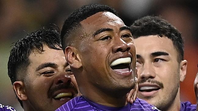 TOWNSVILLE, AUSTRALIA - AUGUST 29: Lazarus Vaalepu of the Storm celebrates after scoring a try  during the round 26 NRL match between North Queensland Cowboys and Melbourne Storm at Qld Country Bank Stadium, on August 29, 2024, in Townsville, Australia. (Photo by Ian Hitchcock/Getty Images)