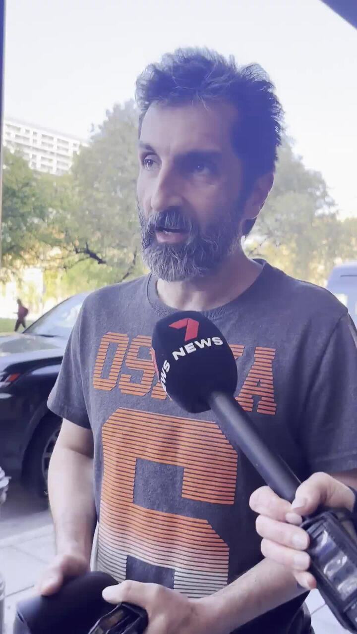 Iranian-born refugee Payam Saadat leaving court