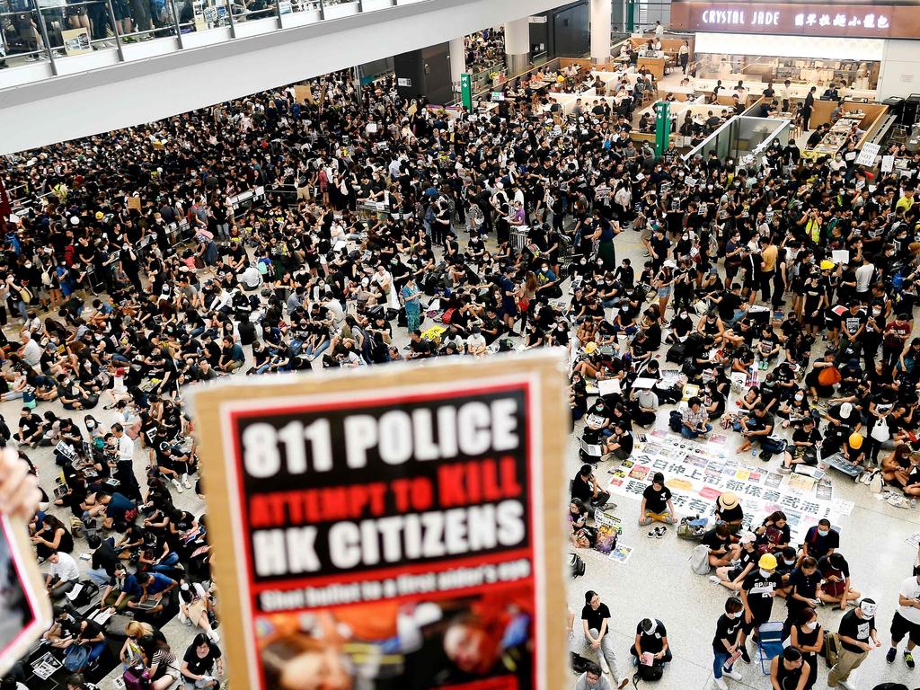 Pro-democracy protesters gather against the police brutality and the controversial extradition bill at Hong Kong's international airport on August 12, 2019. Picture: AFP