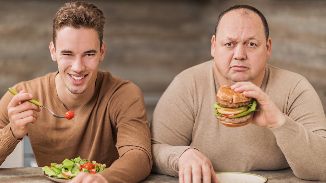 Which are you? A man smiling while eating a salad, or a sad man eating a hamburger?