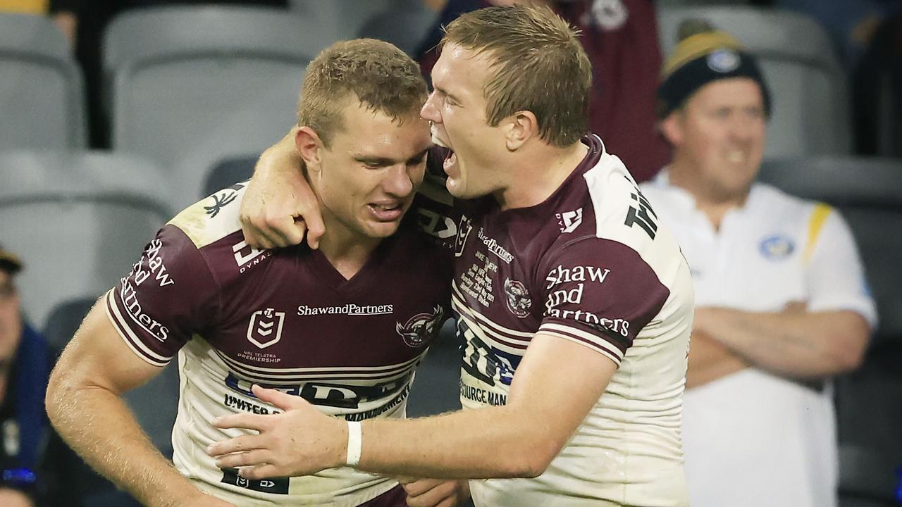 SYDNEY, AUSTRALIA - MAY 23: Tom and Jake Trbojevic of Manly celebrate their win during the round 11 NRL match between the Parramatta Eels and the Manly Sea Eagles at Bankwest Stadium, on May 23, 2021, in Sydney, Australia. (Photo by Mark Evans/Getty Images)