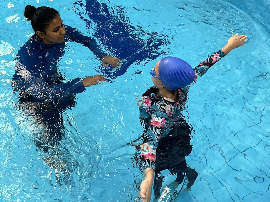 Liverpool, NSW: Afghan refugee women dive into swim lessons | Daily ...