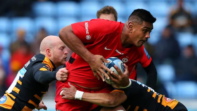 COVENTRY, ENGLAND - APRIL 27:  Will Skelton of Saracens is tackled by Joe Simpson and Marcus Watson of Wasps during the Gallagher Premiership Rugby match between Wasps and Saracens at Ricoh Arena on April 27, 2019 in Coventry, United Kingdom. (Photo by Alex Livesey/Getty Images)