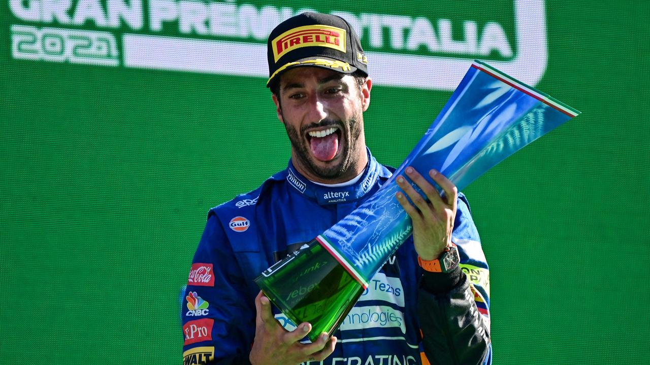 Winner McLaren's Australian driver Daniel Ricciardo celebrates during the podium ceremony.
