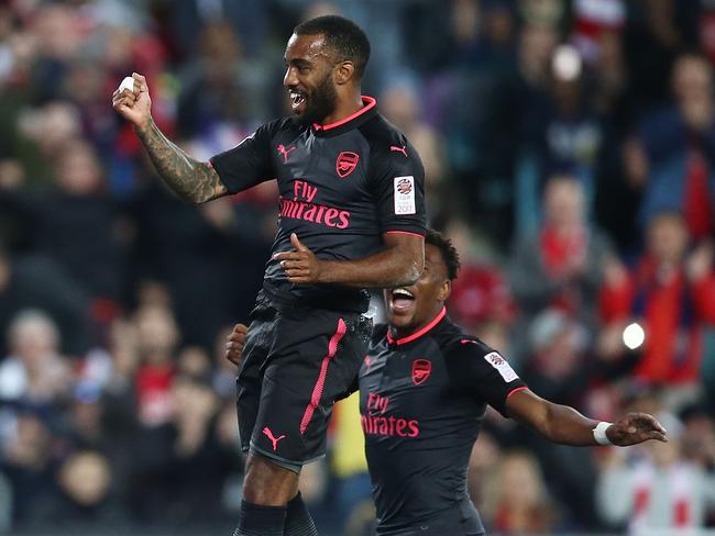 SYDNEY, AUSTRALIA - JULY 13:  Alexandre Lacazette of Arsenal celebrates scoring a goal during the match between Sydney FC and Arsenal FC at ANZ Stadium on July 13, 2017 in Sydney, Australia.  (Photo by Mark Metcalfe/Getty Images)