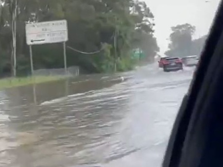 Flash flooding over Gympie Road at Carseldine. Picture: Julie Walford