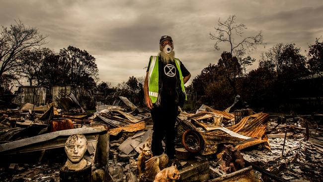 Don Ashby amid the rubble in Mallacoota. Picture: Rachel Mounsey